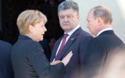 Da sx: Angela Merkel, Petro Poroshenko e Vladimir Putin